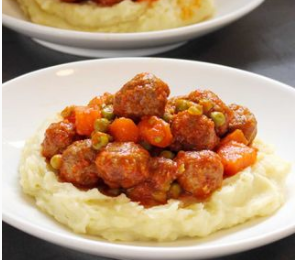 Patates püresi eşliğinde bezelyeli misket köfte